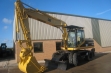 Колесный экскаватор Caterpillar