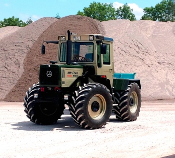 Тракторное коммунальное шасси Unimog