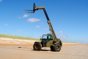 Погрузчик с телескопической стрелой Manitou